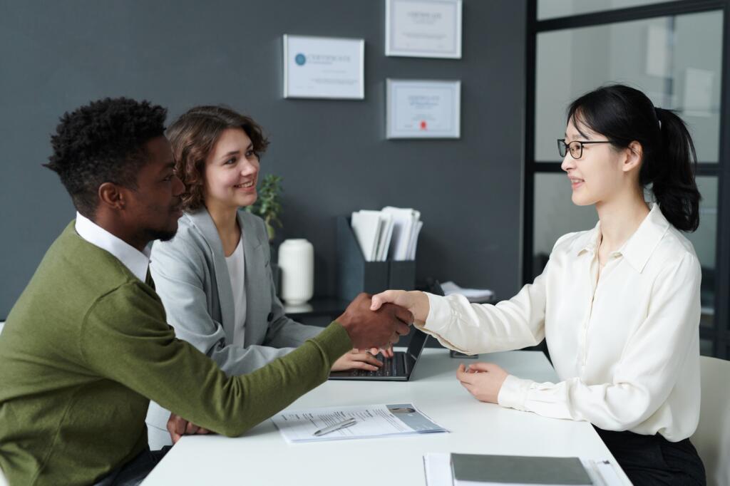 Employer shaking hands with candidate