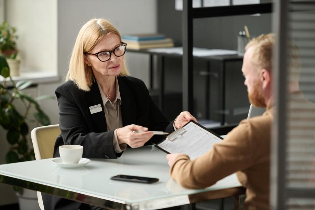 Female social worker consulting person